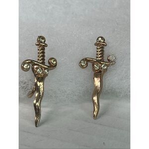 Vintage fierce screwback dagger style punk earrings.